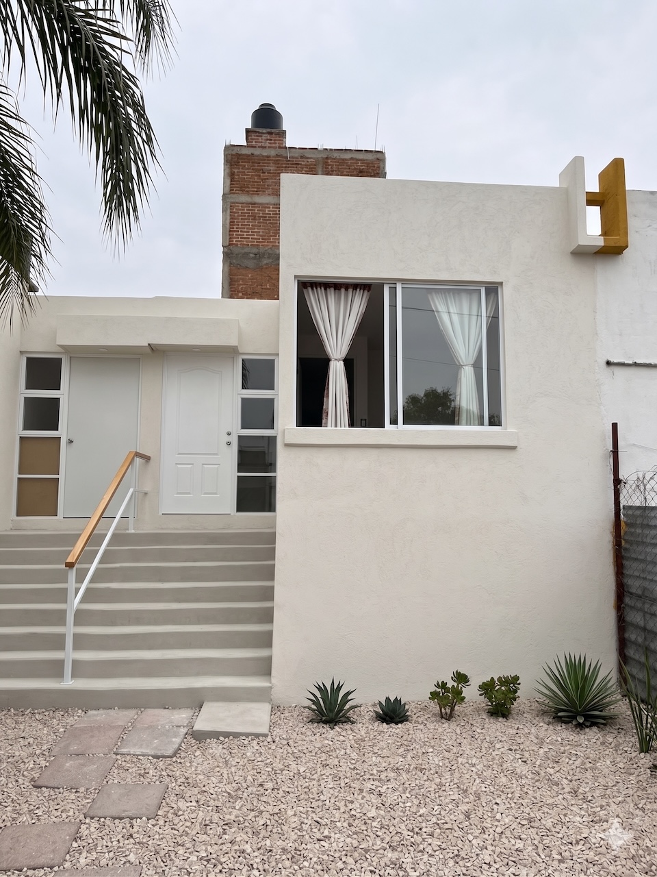 Fachada de la propiedad del caso 1 después de la renovación